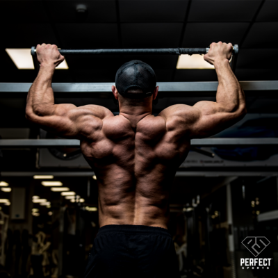 Image of guy with back muscles down overhand grip pull ups